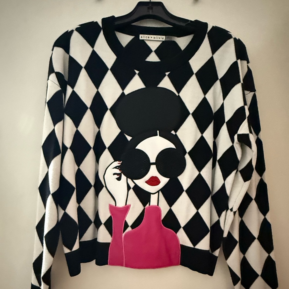 Alice + Olivia Graphic Harlequin Sweater in Black, White, and Pink